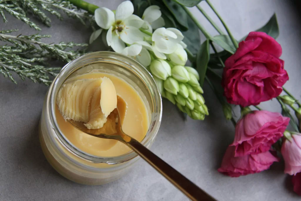Creamed honey with smooth spreadable texture in a glass jar